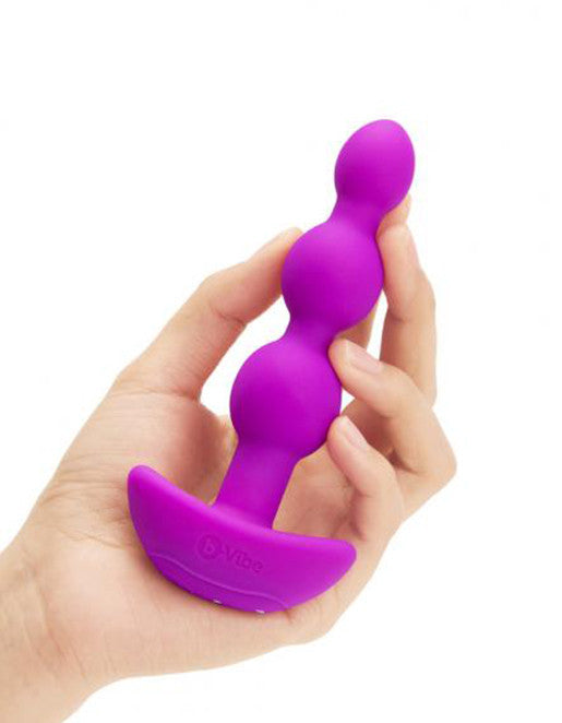 B-Vibe Triplet Vibrating Anal Beads- Pink- In hand