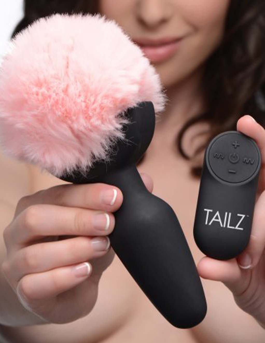 Tailz Vibrating Pink Bunny Tail Plug- In Hand